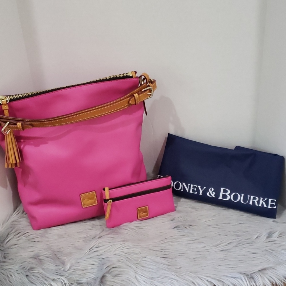 Fuchsia pink dooney and bourke bucket bag w/clutch